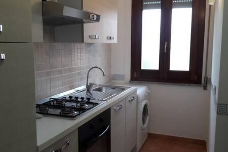 Апартаменты Andrea'S House Карбония Экстерьер фото